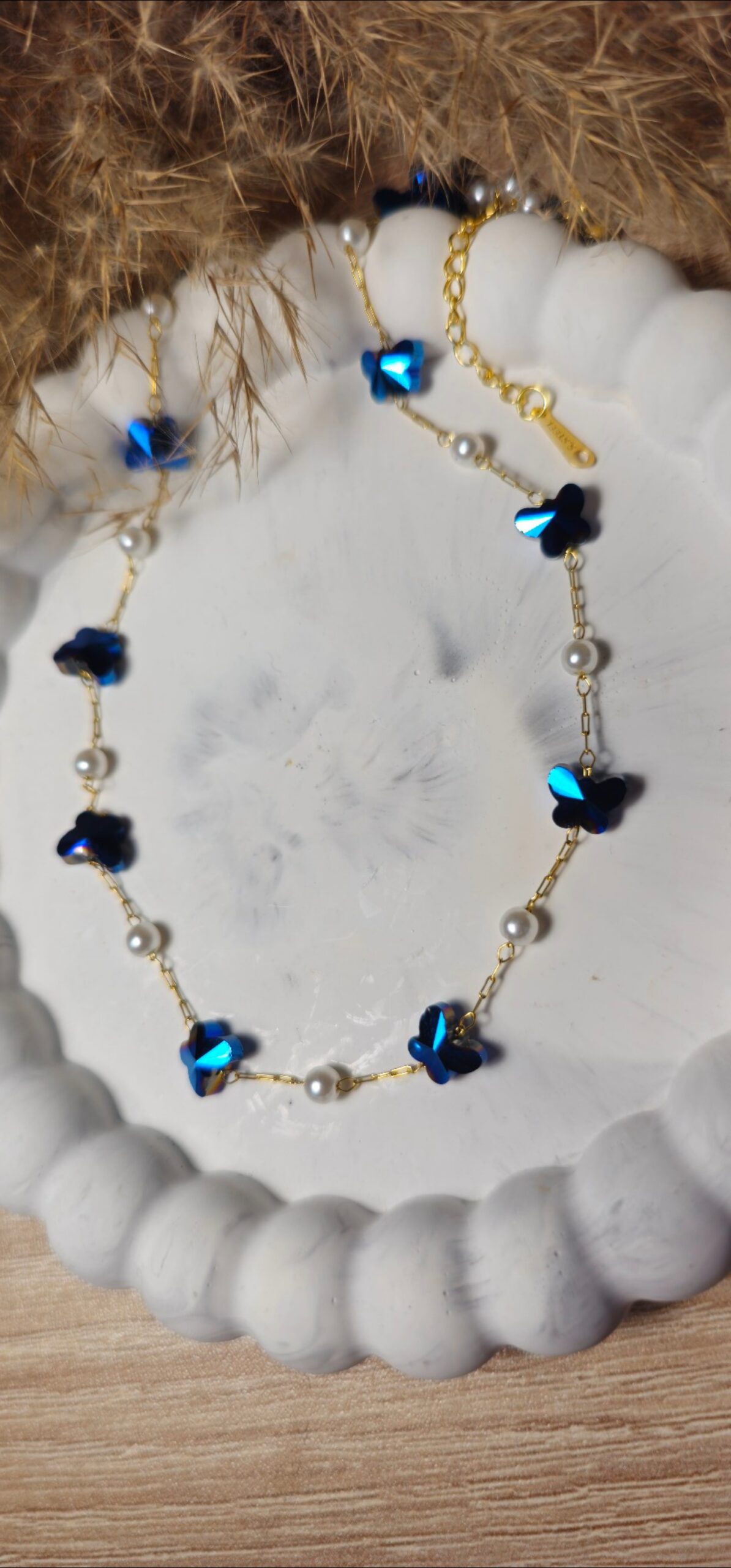 inbound3924885763938642753 Blue butterfly pearl necklace - Image 1